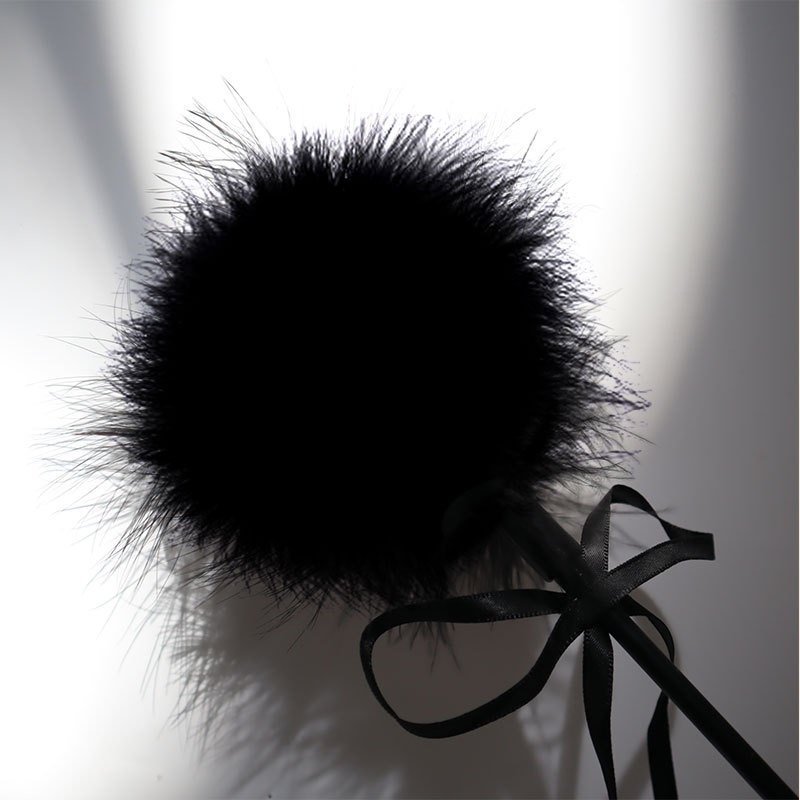Feather Crop — Noir Rouge. Handmade full-grain leather paddle. UK bondage accessories for couples.