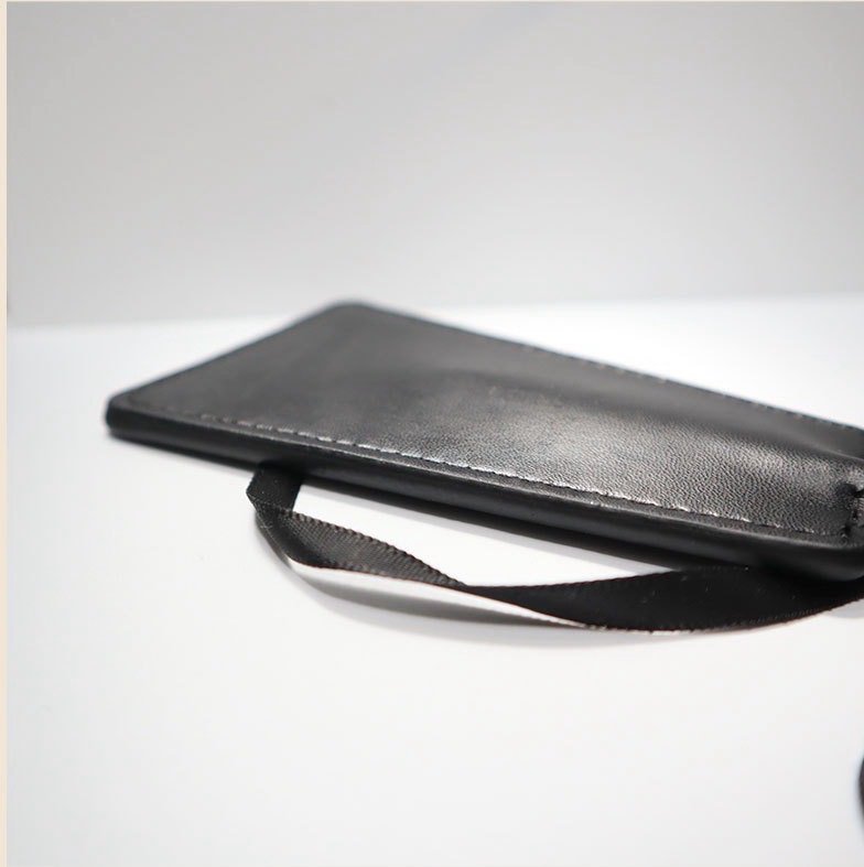 Feather Crop — Noir Rouge. Handmade full-grain leather paddle. UK bondage accessories for couples.