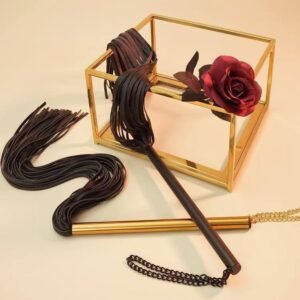 Tassel Leather Paddle — Noir Rouge. Handmade full-grain leather paddle. UK bondage accessories for couples.
