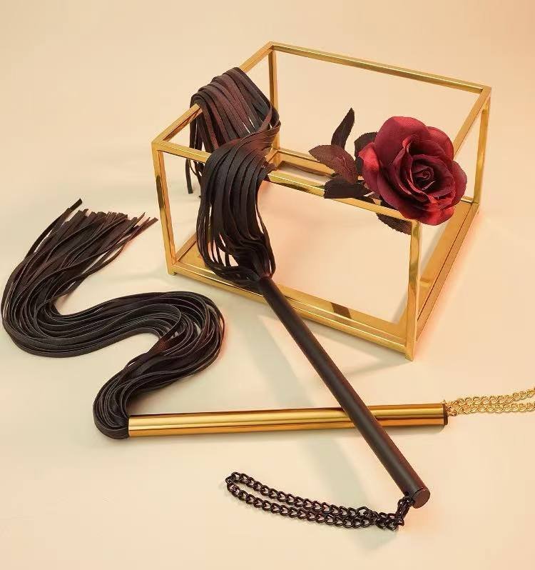 Tassel Leather Paddle — Noir Rouge. Handmade full-grain leather paddle. UK bondage accessories for couples.